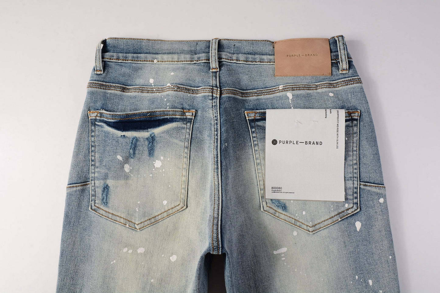 PURPLE Men Streetwear Skinny Jeans Light Blue Wash with Heavy Distressed Rips and White Paint Splatter 9003